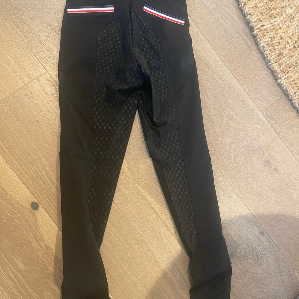 Black Riding Pants with Red and White Accents